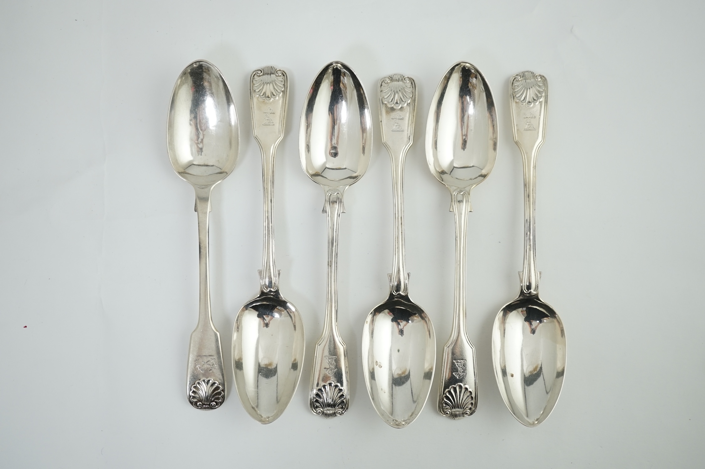 A set of five Victorian silver fiddle, thread and shell pattern table spoons, by Henry John Lias and James Wakely, London, 1879 and a Victorian fiddle and shell pattern table spoon, 1848